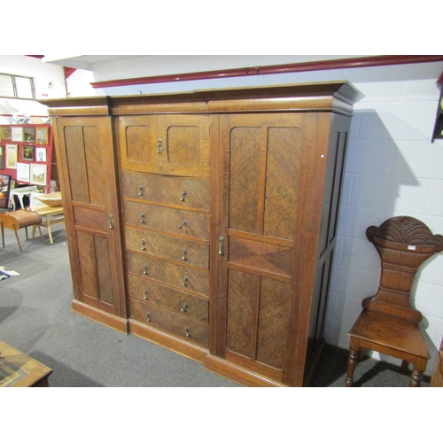 1015 - An early 20th Century compactum, two cupboard doors over six drawers flanked by two doors, 186cm tal... 