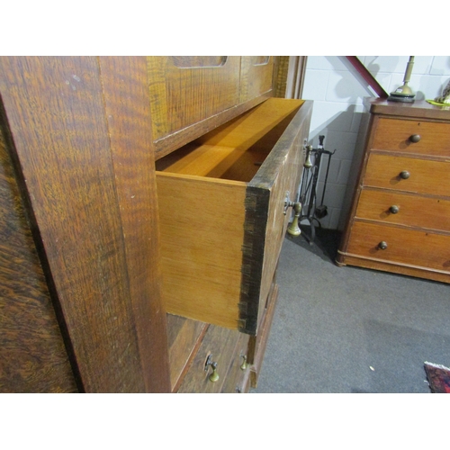 1015 - An early 20th Century compactum, two cupboard doors over six drawers flanked by two doors, 186cm tal... 