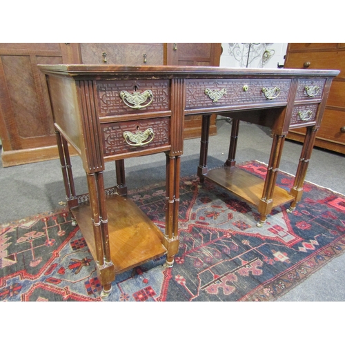 1018 - A Chippendale influenced late Victorian/early Edwardian leather topped twin pedestal desk with blind... 