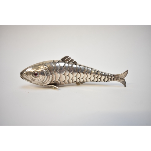 8022 - A well modelled late Victorian silver articulated fish pill box. Eighteen sectioned body with hinged... 