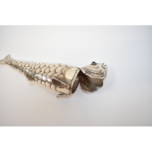 8022 - A well modelled late Victorian silver articulated fish pill box. Eighteen sectioned body with hinged... 