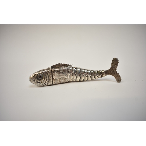 8025 - A white metal articulated fish, scent bottle the twelve sectioned body with nice detail. The hinged ... 