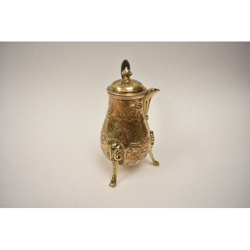 8100 - A 19th Century French silver gilt chocolate pot with ebony handle, 13cm tall, 159g