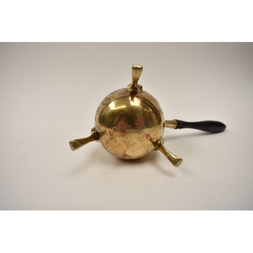 8100 - A 19th Century French silver gilt chocolate pot with ebony handle, 13cm tall, 159g