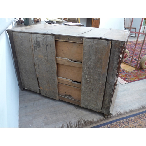 8488 - A late 17th/18th Century oak coffer on cupboard base with drawers to the interior, geometric moulded... 