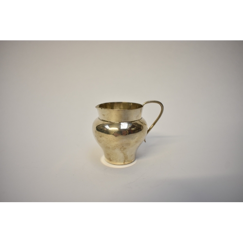 8049 - A John Hines silver miniature cream jug, Birmingham 1901, 5cm tall, 25g