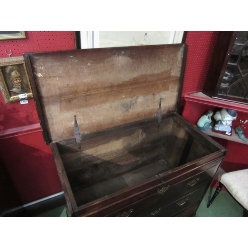 4039 - An 18th Century provincial oak chest, the hinged lid over two faux drawers and two short base drawer... 