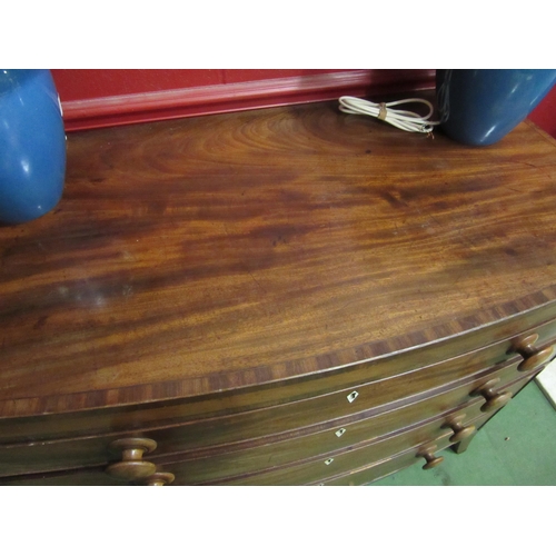 4144 - An 18th Century George III mahogany bow front chest of four long graduated drawers, with cross-bande... 