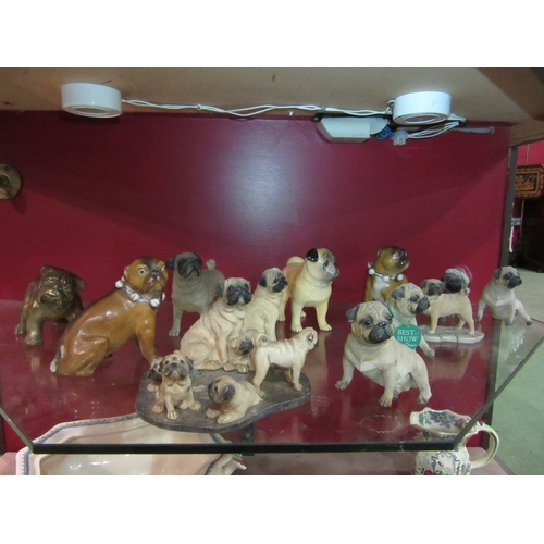 4006 - A collection of Pug dog figures including Country Artists and 19th Century style etc. Some a/f