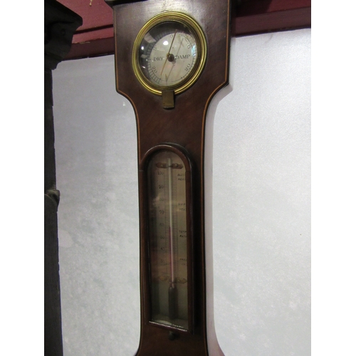 4017 - A 19th Century mahogany five dial barometer with satinwood stringing, ivorine knob