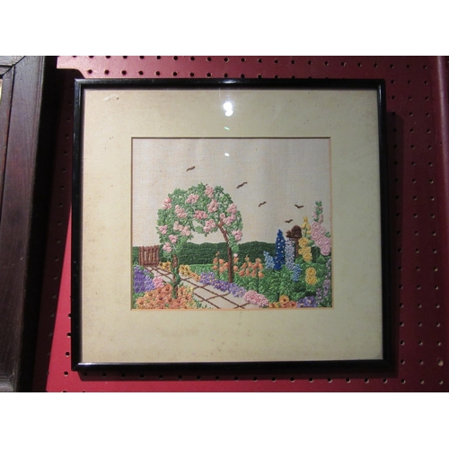 4057 - An embroidered picture depicting a garden, 17cm x 20cm image size, and a large example of flowers in... 