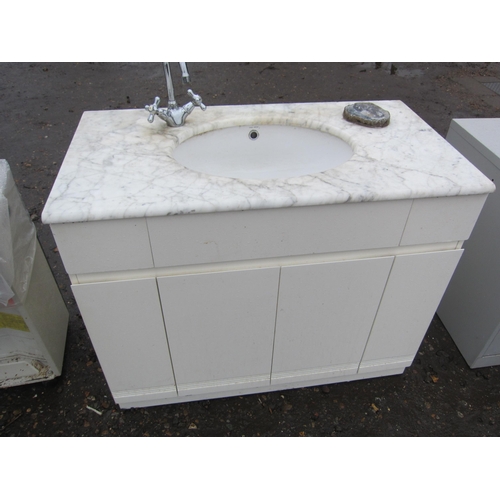 3333 - A vanity unit with a marble top and white ceramic hand basin