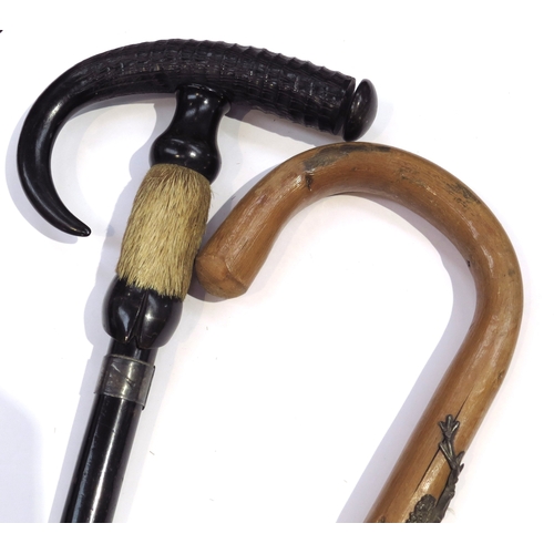 8613 - An Alpine walking stick with shield badges and another with a twisted antler handle (2)