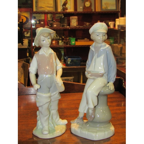 4193 - Two Lladro figurines including boy with pond yacht, chip to hat of other, 22cm tall