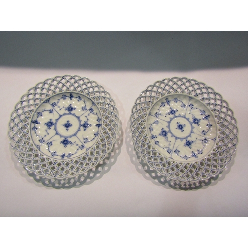 4243 - A pair of Royal Copenhagen blue fluted full lace plates, stamped 1/1135 on base, 25cm diameter