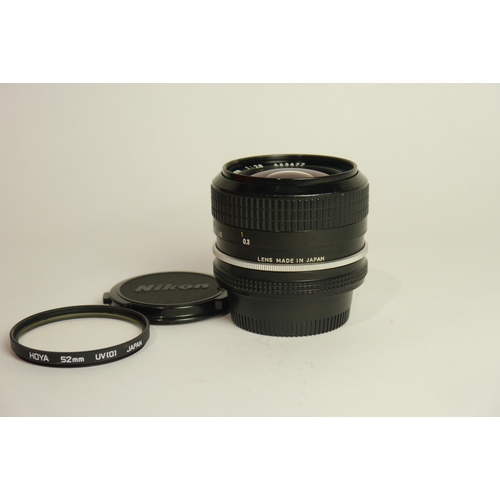 6052 - A Nikon Nikkor f2.8 24mm lens & a Chinon Multi-coated f1.7 55mm lens