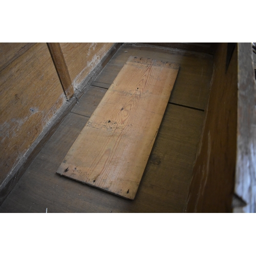 8488 - A late 17th/18th Century oak coffer on cupboard base with drawers to the interior, geometric moulded... 