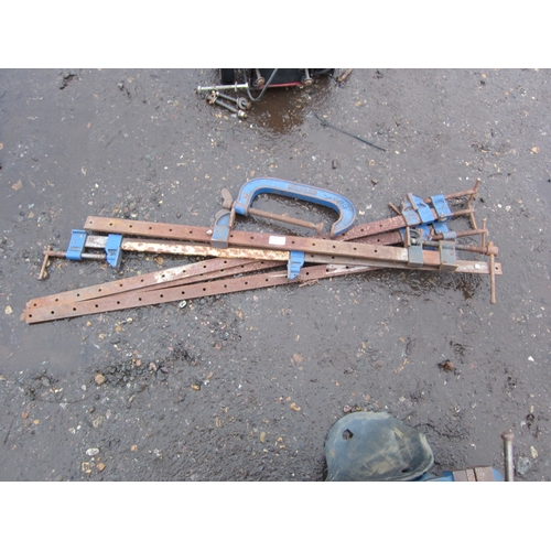 3340 - Three sash clamps and a G clamp