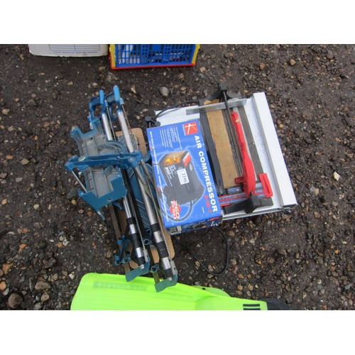 3346 - Two mitre saws, a tile cutter and a boxed three in one compressor.  DTI FAILURE:  Please see our inf... 