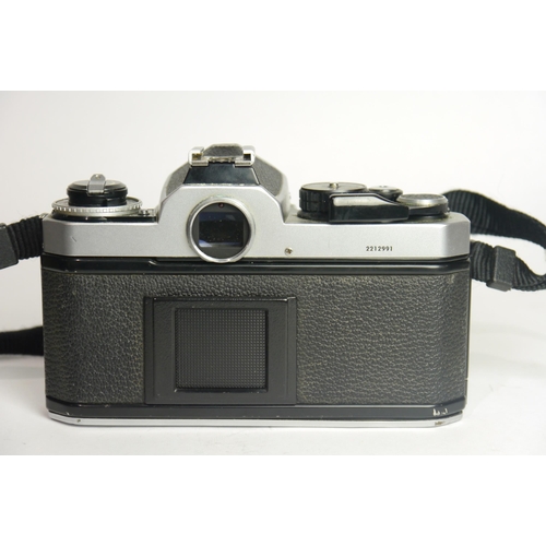 6009 - A Nikon FE2 SLR 35mm Film camera w/ Nikon MD-12 Motor Drive
Both Camera & Motor Drive come with Inst... 