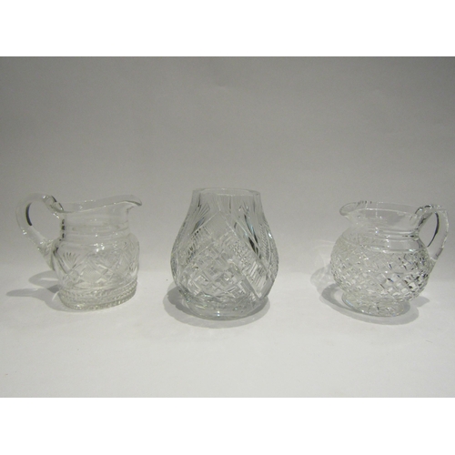 4407 - Two cut glass water jugs and a cut glass vase (3)