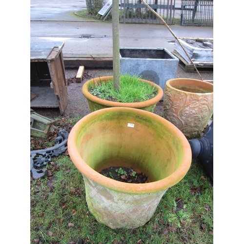 7040 - A pair of terracotta basket weave planters, 47cm tall, 60cm diameter at top