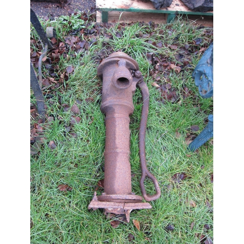 7053 - A cast iron water pump, 71cm tall