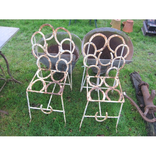 7080 - Two garden chairs, the seat and backs made from horseshoes