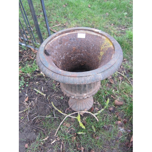 7098 - A cast iron garden urn, egg and dart rim, 43cm tall