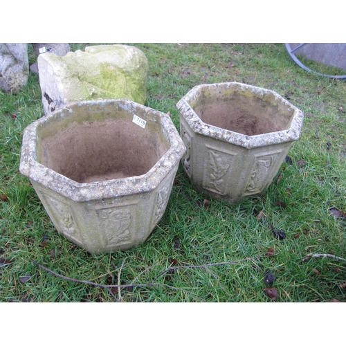 7118 - A pair of 'Willowstone' octagonal planters, 26cm tall