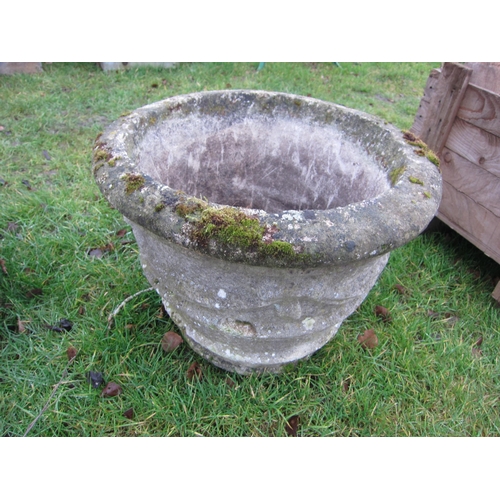 7119 - A composition weathered swagged circular planter, 40cm tall