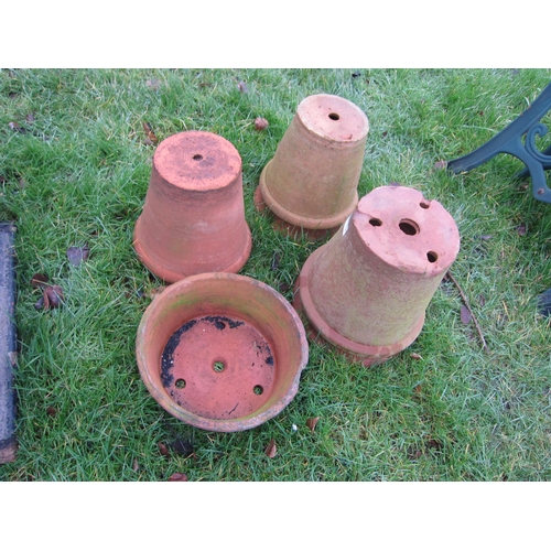 7123 - Six terracotta pots and saucer