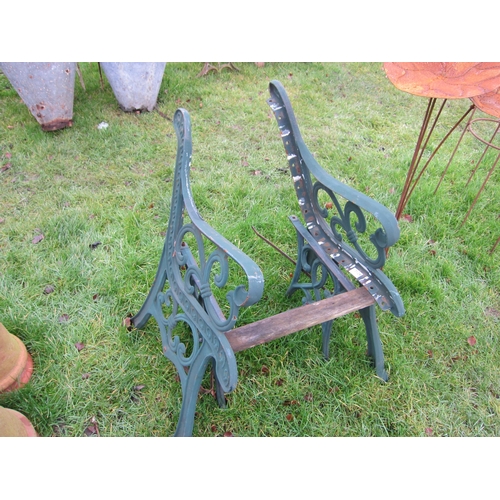 7124 - A cast iron garden chair, wooden seat, a/f