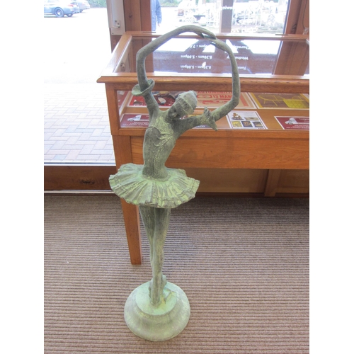 7456 - A pair of verdigris cast iron garden ballerinas, 123cm tall