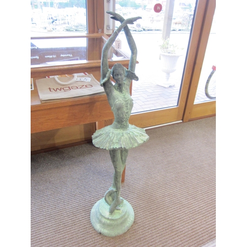 7456 - A pair of verdigris cast iron garden ballerinas, 123cm tall