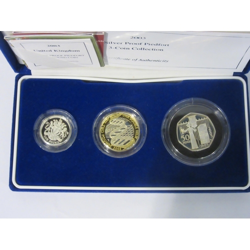 4282 - Two cased and boxed Royal mint 2003 Silver proof Piedfort three coin sets