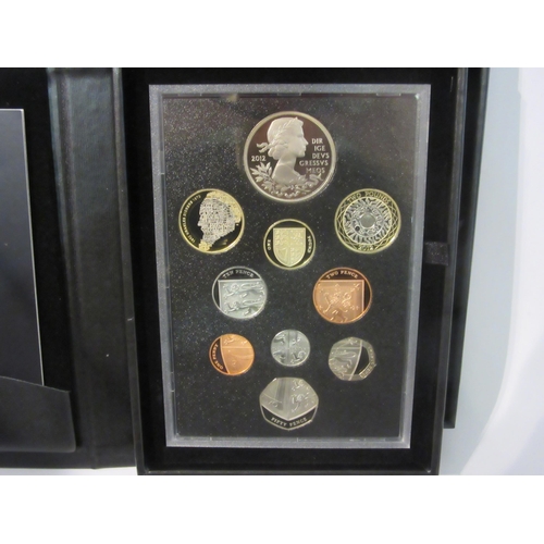 4300 - Two cased and boxed 2012 Royal mint proof coin sets