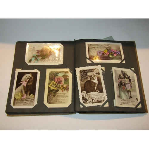 4268 - Two early 20th Century postcard albums and two early 20th Century stamp albums (4)