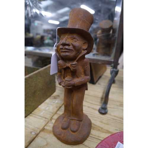 2062 - A cast iron Mad Hatter door stop