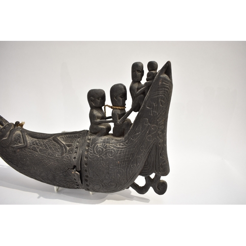 8621 - A Batak medicine horn Sumatra Indonesia.  The back horn body decorated with lizard and the end carve... 