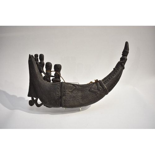 8621 - A Batak medicine horn Sumatra Indonesia.  The back horn body decorated with lizard and the end carve... 