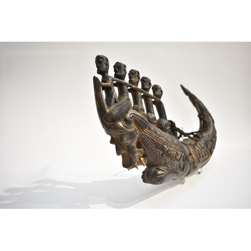 8622 - A Batak medicine horn Sumatra Indonesia.  The black polished horn body carved with Lizard and serpen... 