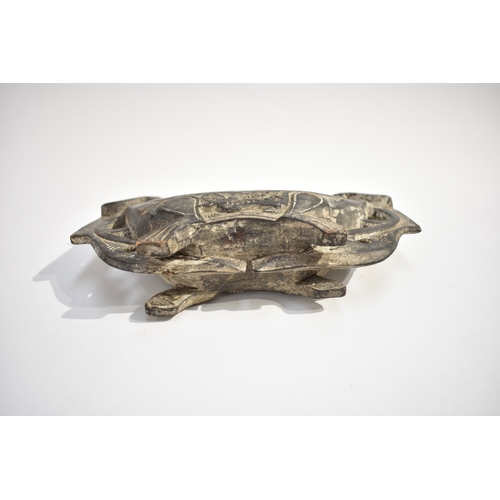 8627 - A Tribal interest carved wood lidded vessel with mythical creature detail.  12cm tall x 21cm long