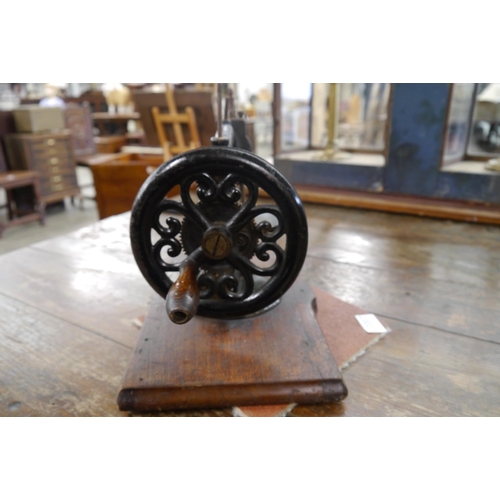 2007 - A Victorian hand driven sewing machine. Little Wanzer 1868