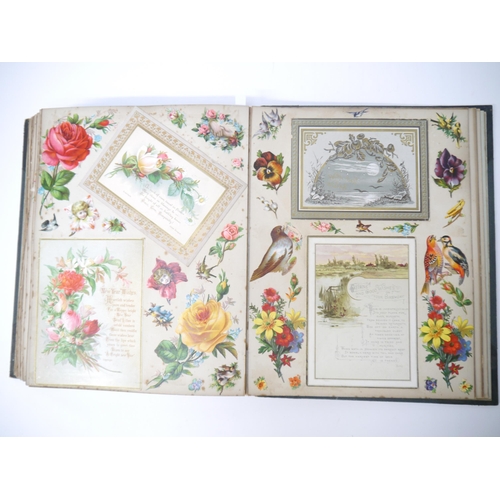 9060 - A Victorian scrap album containing 46 pages of mounted chromolitho scraps and greetings cards etc, i... 