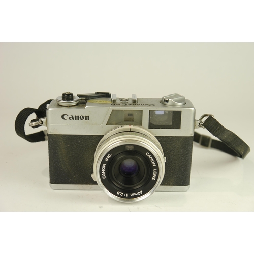 6034 - A Cased Canon Canonet 28 35mm film camera w/Canon Inc F2.8 40mm lens