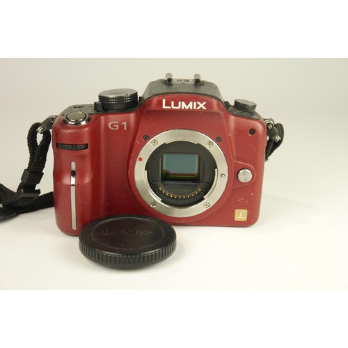 6021 - Two Panasonic Lumix 12.1MP Digital Cameras (Body's Only) Models DMC-GF1 & DMC-G1. 

**Both tested an... 