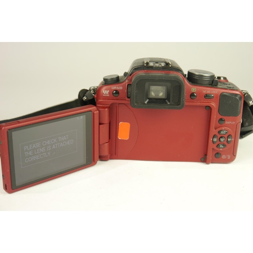 6021 - Two Panasonic Lumix 12.1MP Digital Cameras (Body's Only) Models DMC-GF1 & DMC-G1. 

**Both tested an... 