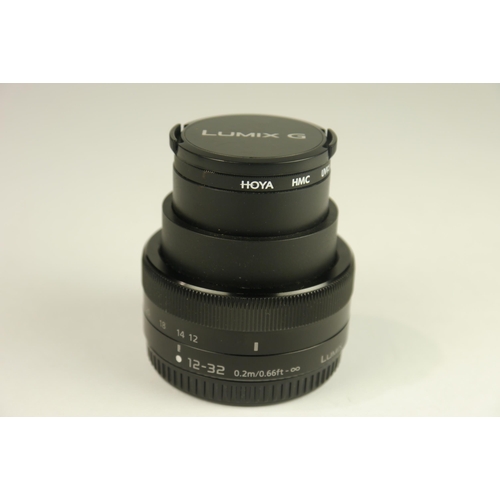 6047 - Three Panasonic Lumix G Varios lenses. 
Models;
H-FS35100 F4.0-5.6 35-100mm ASPH Mega O.I.S
H-FS1203... 