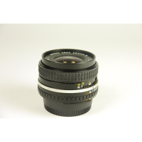 6054 - Two Nikon AIS Series E Lenses:
35mm f/2.5
28mm f/2.8